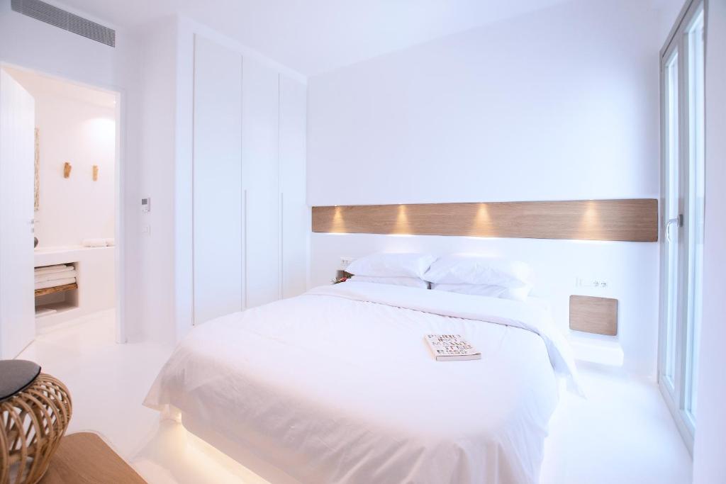 Posteľ alebo postele v izbe v ubytovaní Phos Home by Rocks Estates