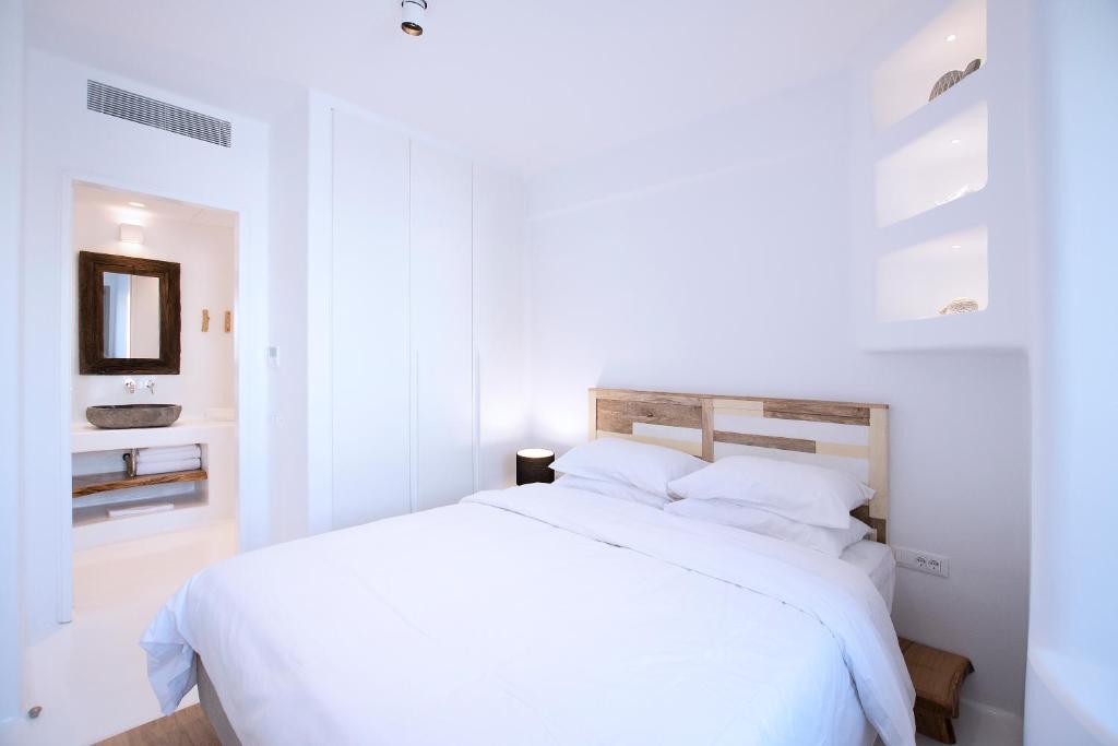 Posteľ alebo postele v izbe v ubytovaní Phos Home by Rocks Estates