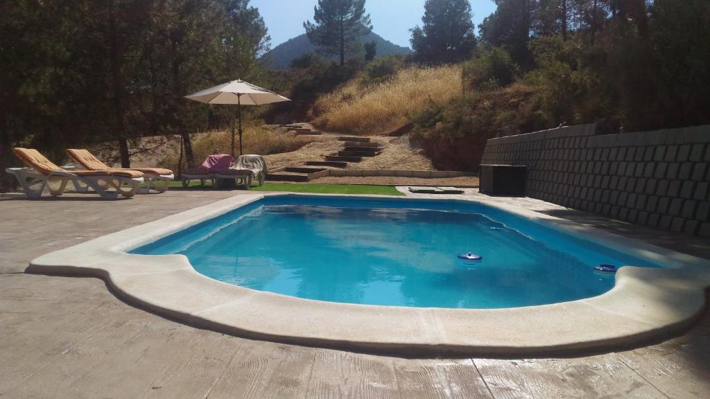 The swimming pool at or close to Casa el Autillo l