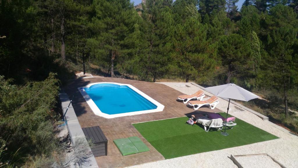 The swimming pool at or close to Casa el Autillo l