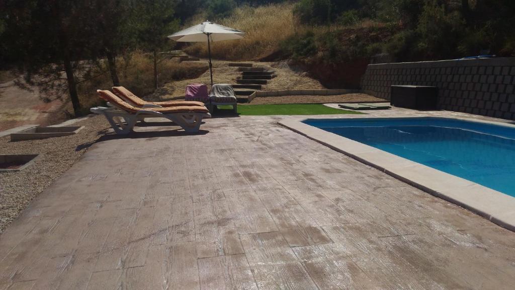 The swimming pool at or close to Casa el Autillo l