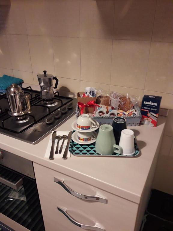 Kuchyň nebo kuchyňský kout v ubytování B&B L'ARANCIO