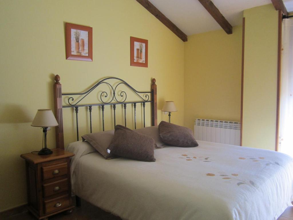 Postel nebo postele na pokoji v ubytování Hotel Rural La Dehesilla