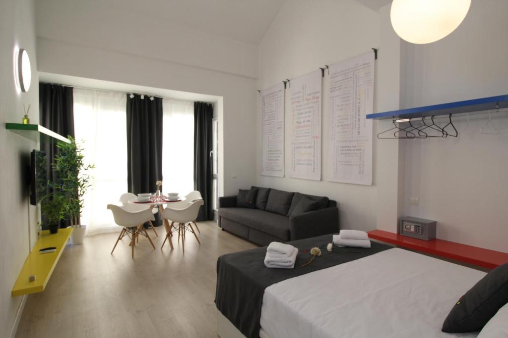 Posteľ alebo postele v izbe v ubytovaní Apartamentos Romero Luna