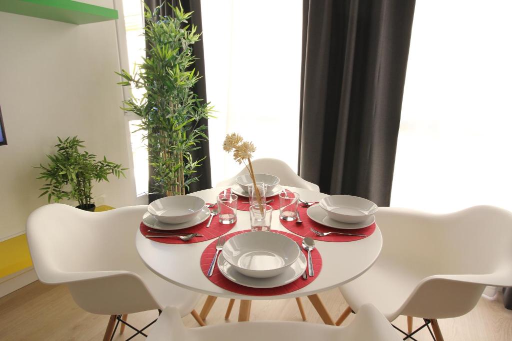 Posedenie v ubytovaní Apartamentos Romero Luna