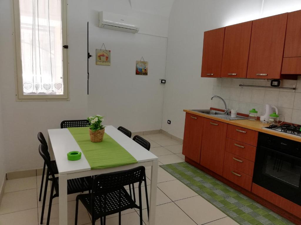 Kuchnia lub aneks kuchenny w obiekcie Dimora 394
