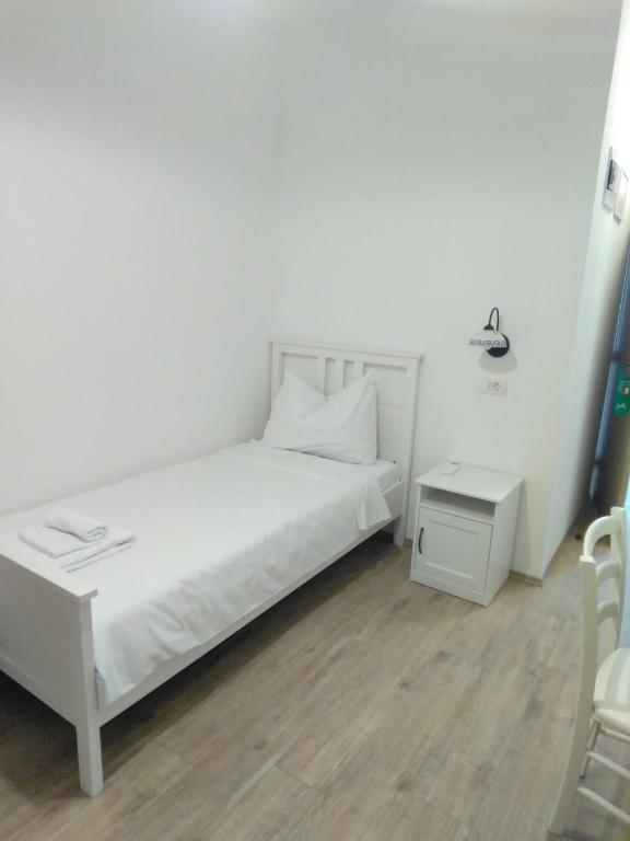 Postel nebo postele na pokoji v ubytování Casa Rossa Motovun