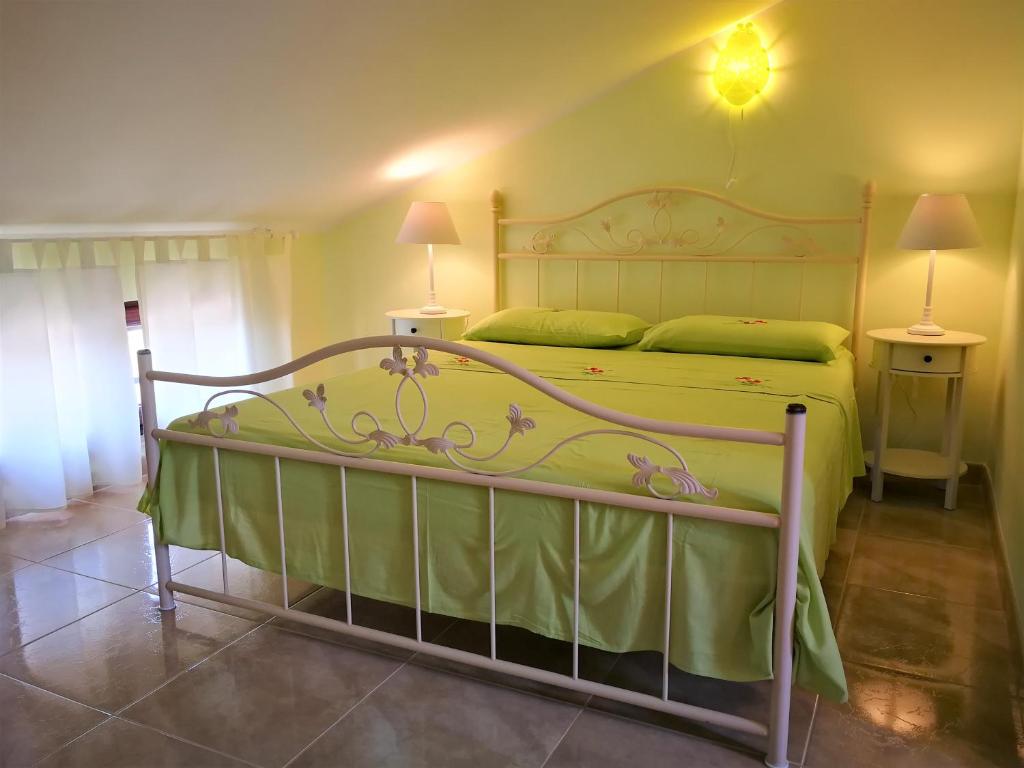 Postel nebo postele na pokoji v ubytování Apartments B&N