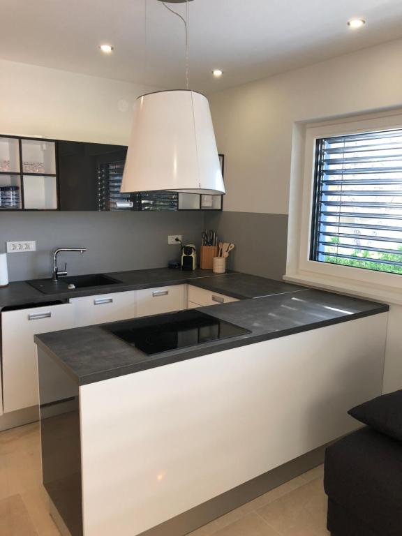 Kuchyňa alebo kuchynka v ubytovaní Apartments Svetec