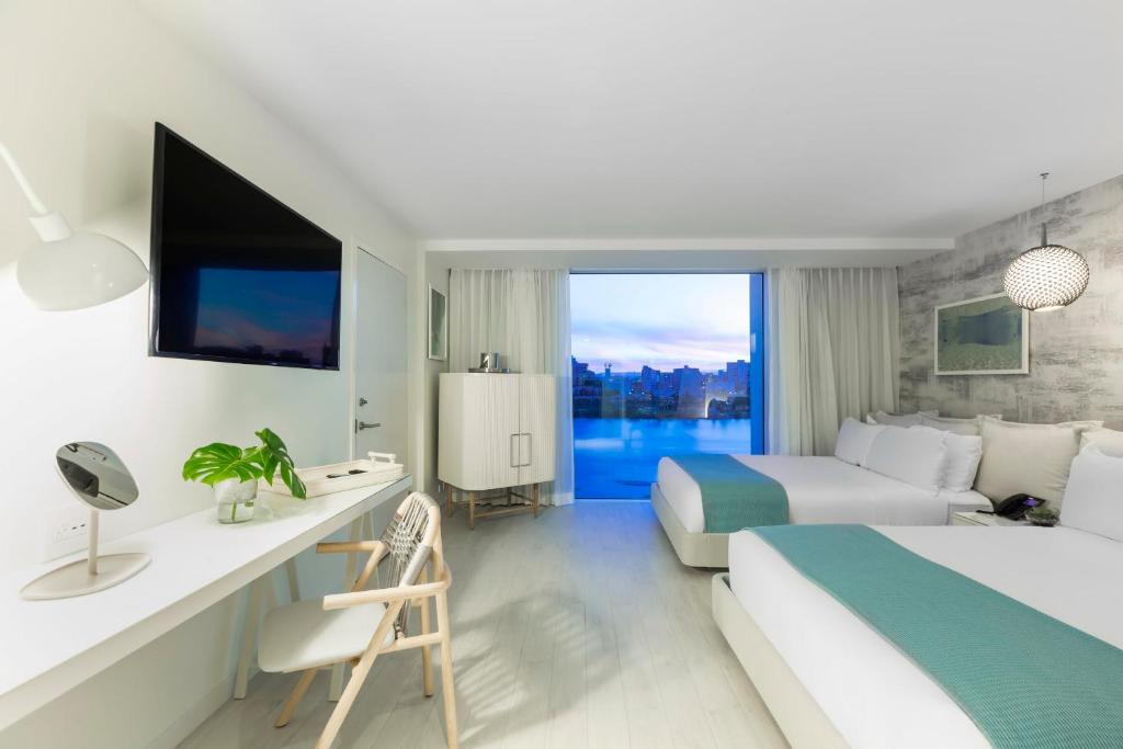 TV a/nebo společenská místnost v ubytování Condado Ocean Club - Adults Only