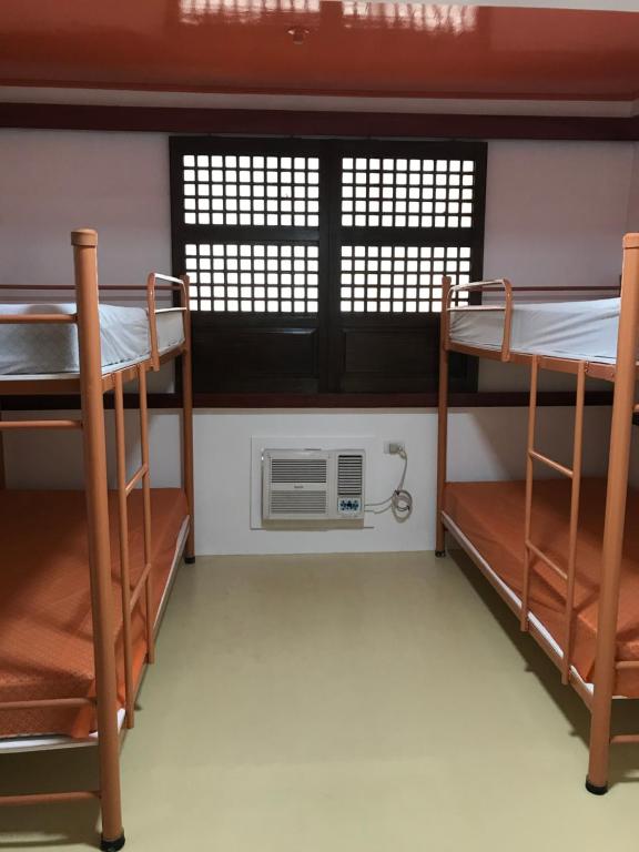 Postel nebo postele na pokoji v ubytování Casa Arrieta Hostel