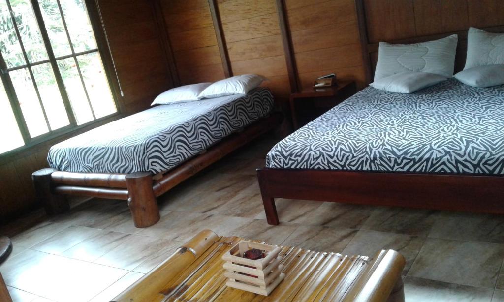 Postel nebo postele na pokoji v ubytování Estancia La Colina