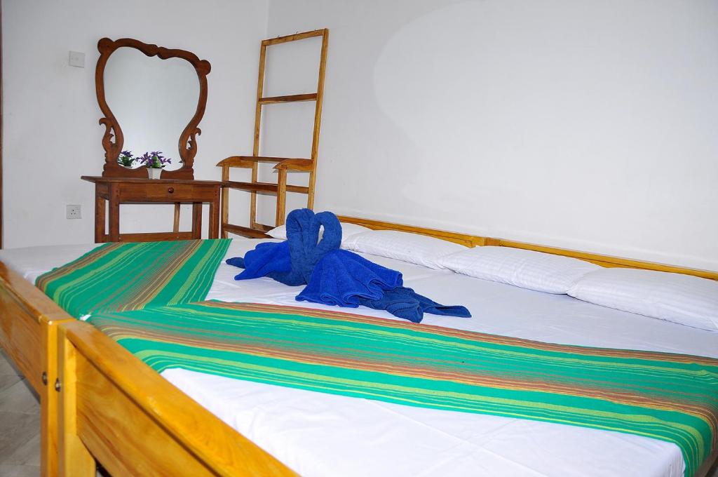 Postel nebo postele na pokoji v ubytování Mother House
