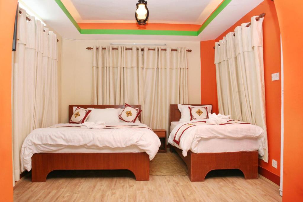 Postel nebo postele na pokoji v ubytování Thamel Backpackers Home