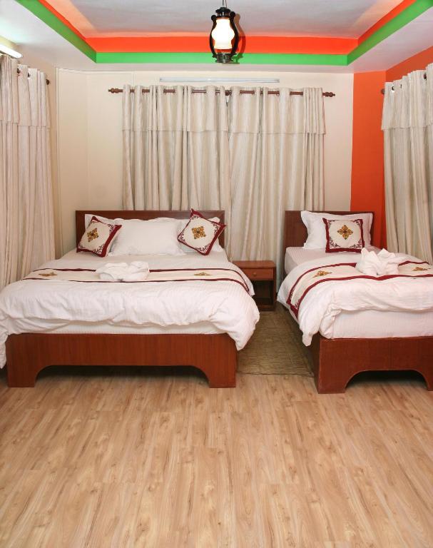Postel nebo postele na pokoji v ubytování Thamel Backpackers Home