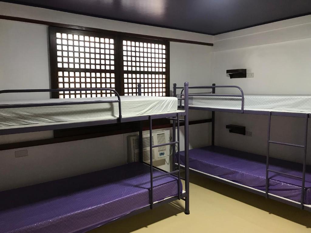 Postel nebo postele na pokoji v ubytování Casa Arrieta Hostel