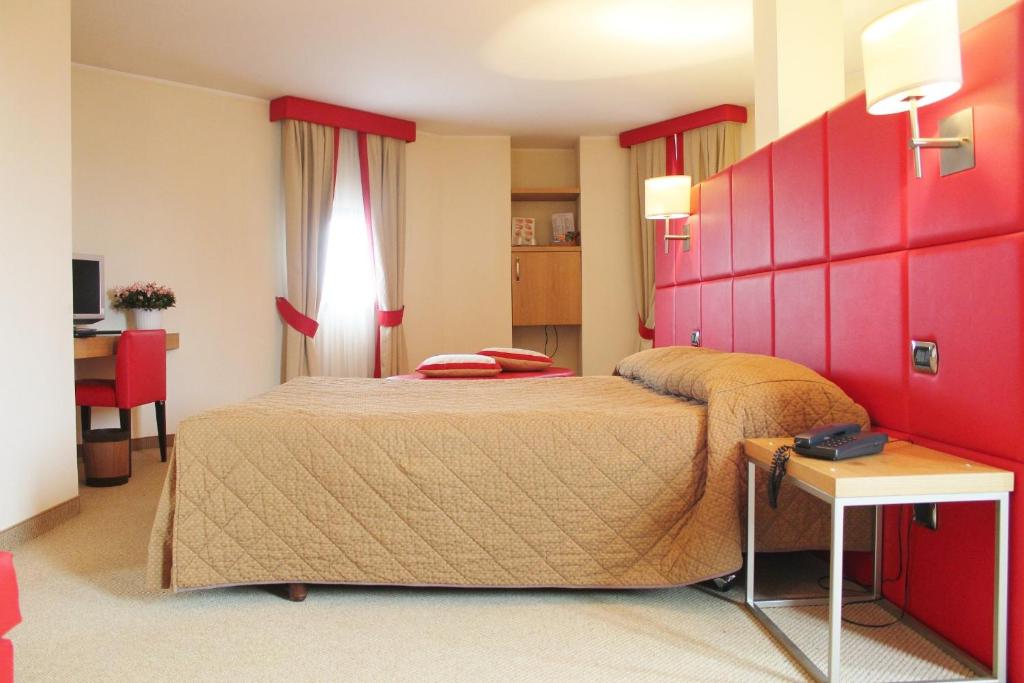 Postel nebo postele na pokoji v ubytování Hotel Motel Futura