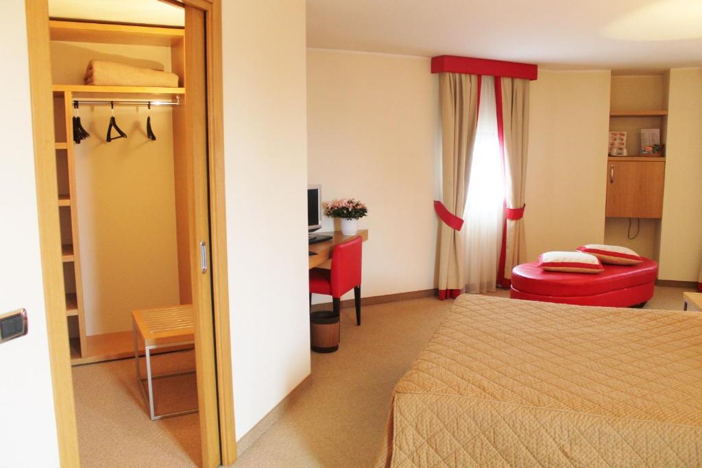 Postel nebo postele na pokoji v ubytování Hotel Motel Futura