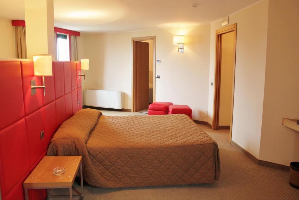 Postel nebo postele na pokoji v ubytování Hotel Motel Futura