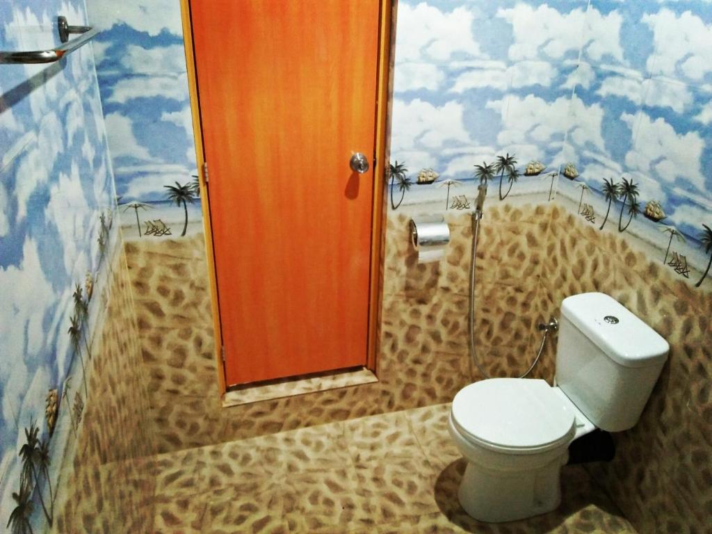 Koupelna v ubytování Sigiri Lakshan Home Stay