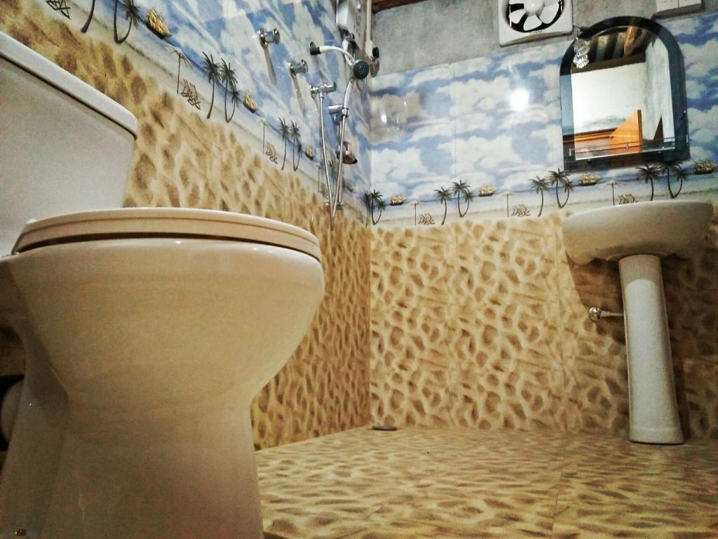 Koupelna v ubytování Sigiri Lakshan Home Stay