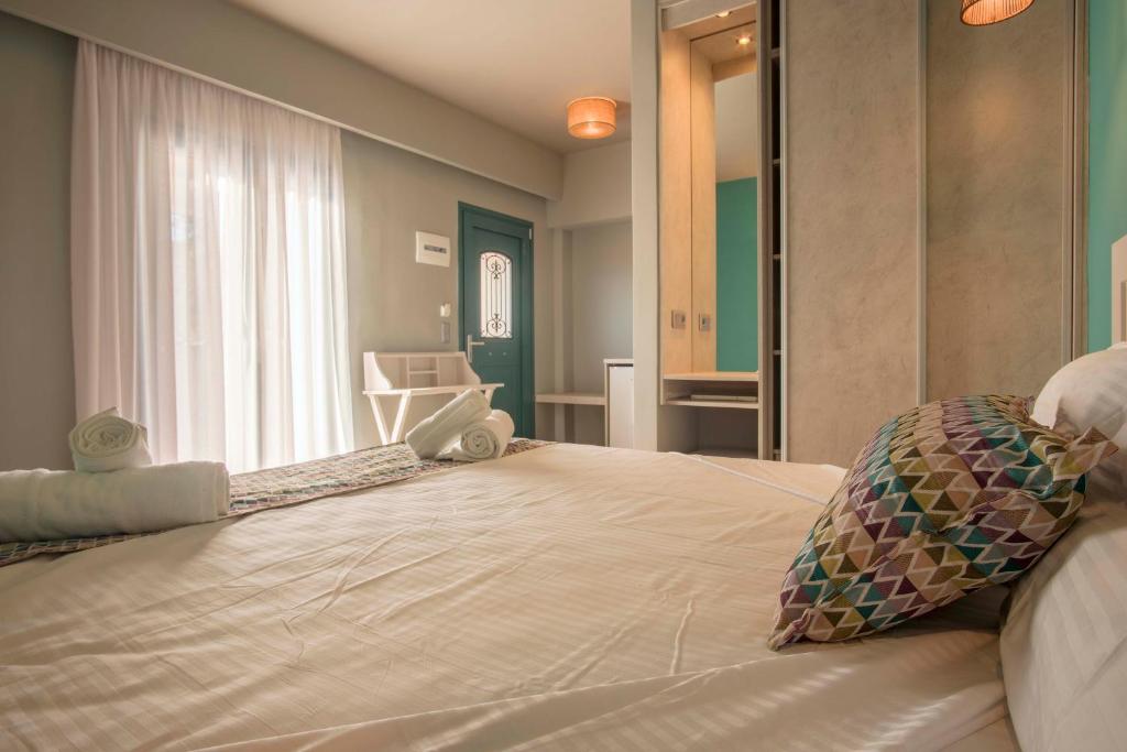 Łóżko lub łóżka w pokoju w obiekcie Armeno Resort