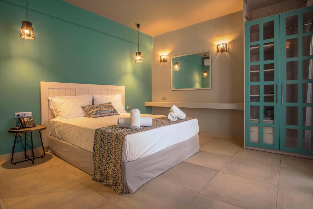 Łóżko lub łóżka w pokoju w obiekcie Armeno Resort