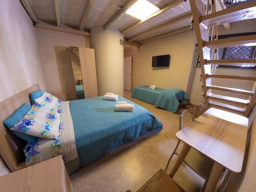 A bed or beds in a room at Casa della Palma