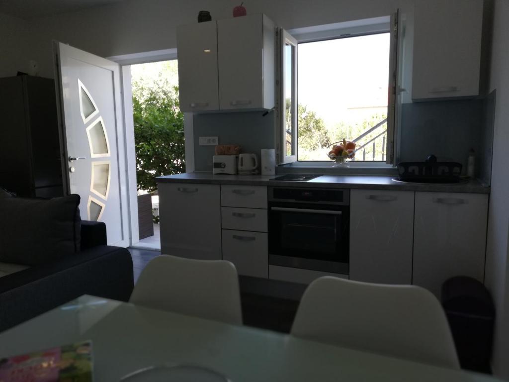 Kuchyň nebo kuchyňský kout v ubytování Modern Apartment near Split & Trogir