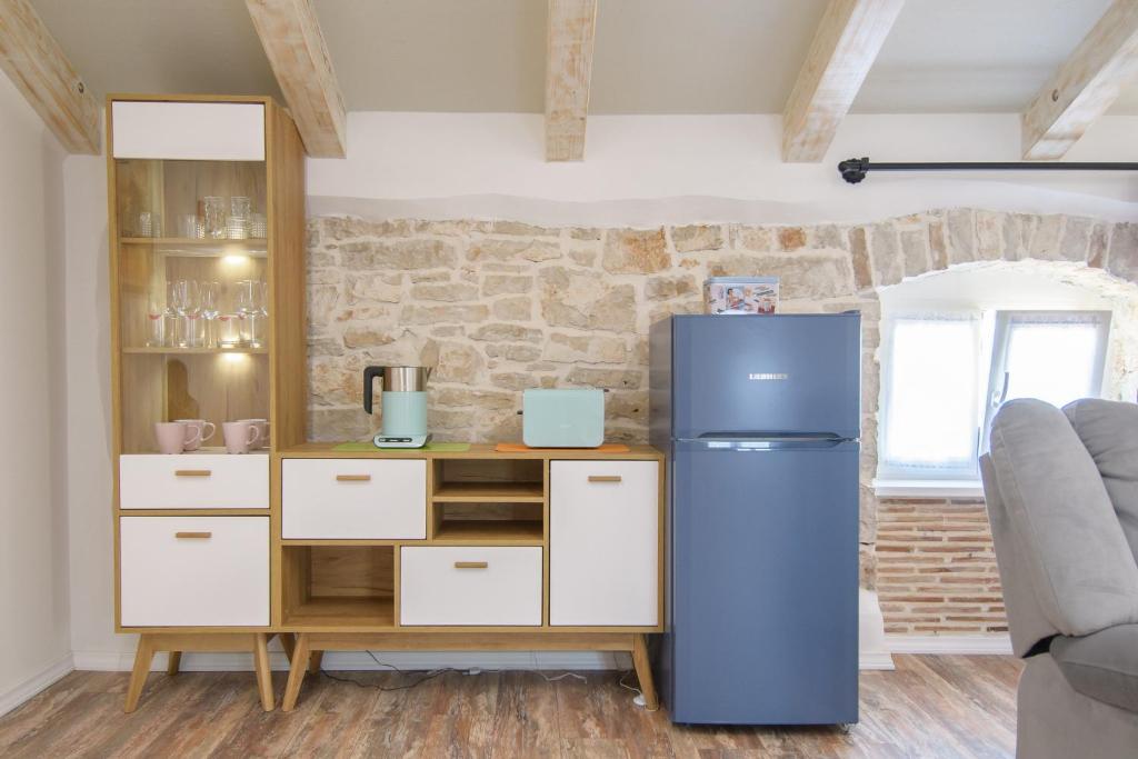 Kuchyň nebo kuchyňský kout v ubytování Apartments Borgo 8