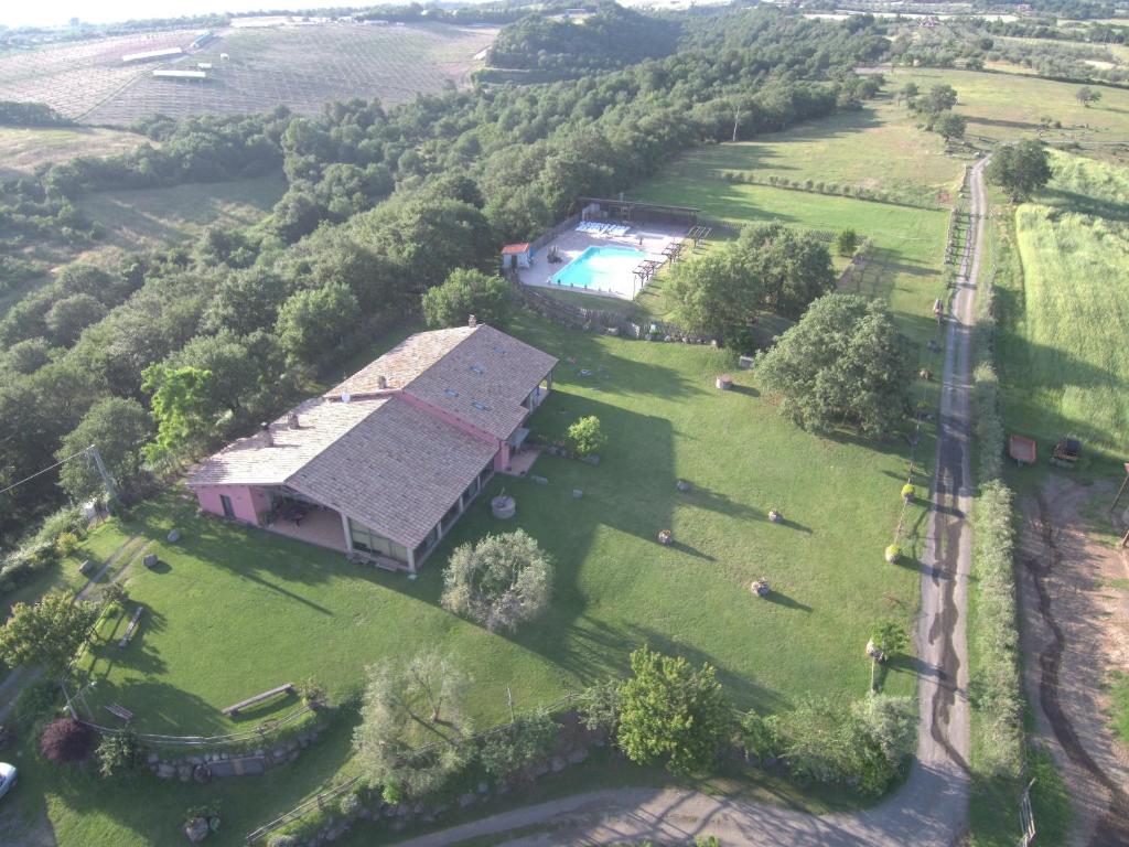 an aerial view of a large house in a field at Agriturismo Poggio Della Capanna in Montefiascone