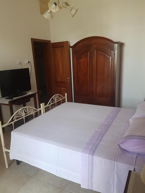Postel nebo postele na pokoji v ubytování Casa Turistica LE SERVITE