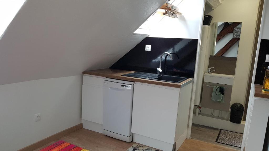 TV a/nebo společenská místnost v ubytování Appartement centre village vue mer - Relais Fleuri