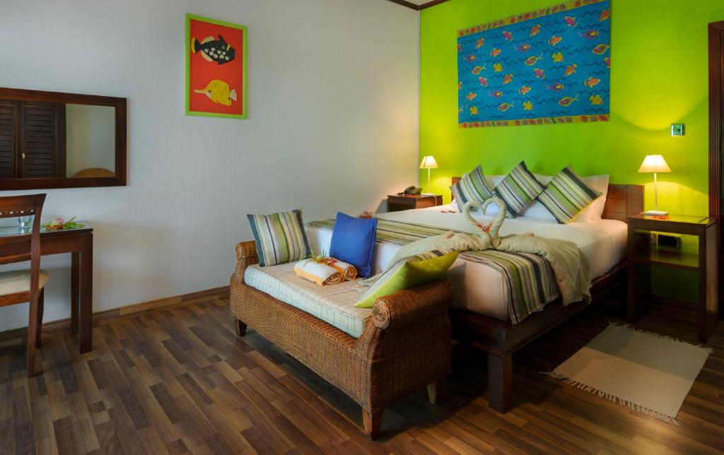 Postel nebo postele na pokoji v ubytování Auberge d'Anse Boileau & Restaurant Chez Plume