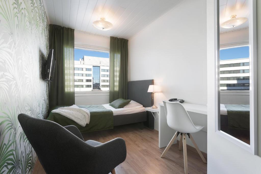 Postel nebo postele na pokoji v ubytování Hotel Milton