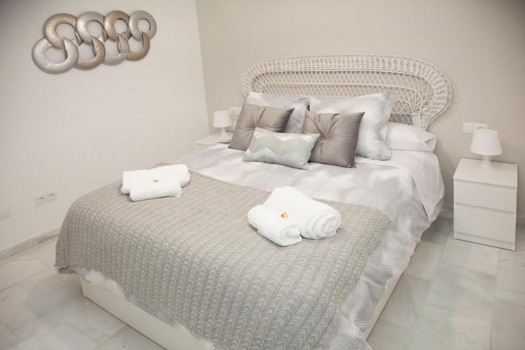 Posteľ alebo postele v izbe v ubytovaní Málaga Peña Historical Centre Apartment