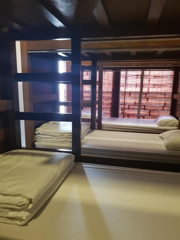 Postel nebo postele na pokoji v ubytování Micasa Hostels
