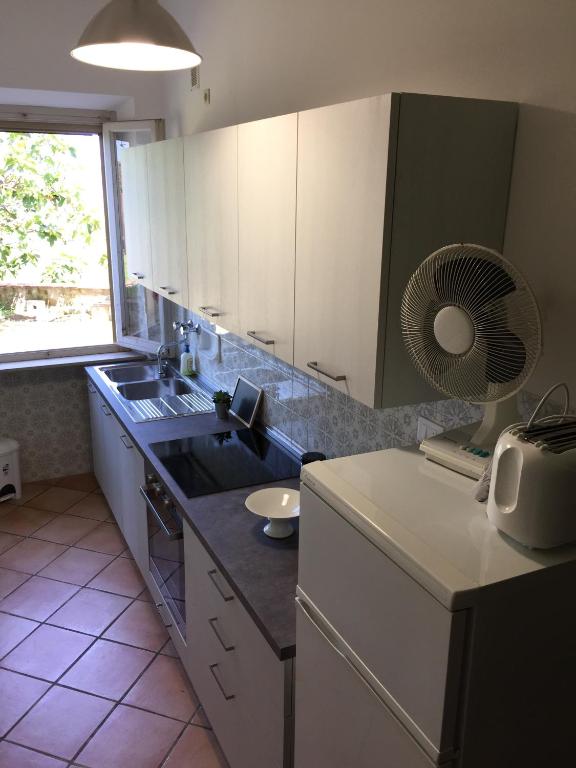 Kuchyň nebo kuchyňský kout v ubytování Casa di Vittoria
