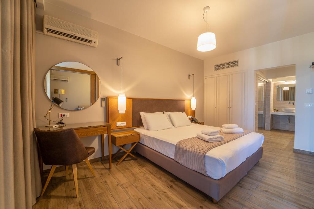 Postel nebo postele na pokoji v ubytování Achilles Hill Hotel