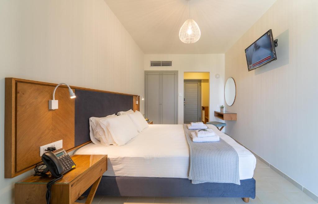 Postel nebo postele na pokoji v ubytování Achilles Hill Hotel