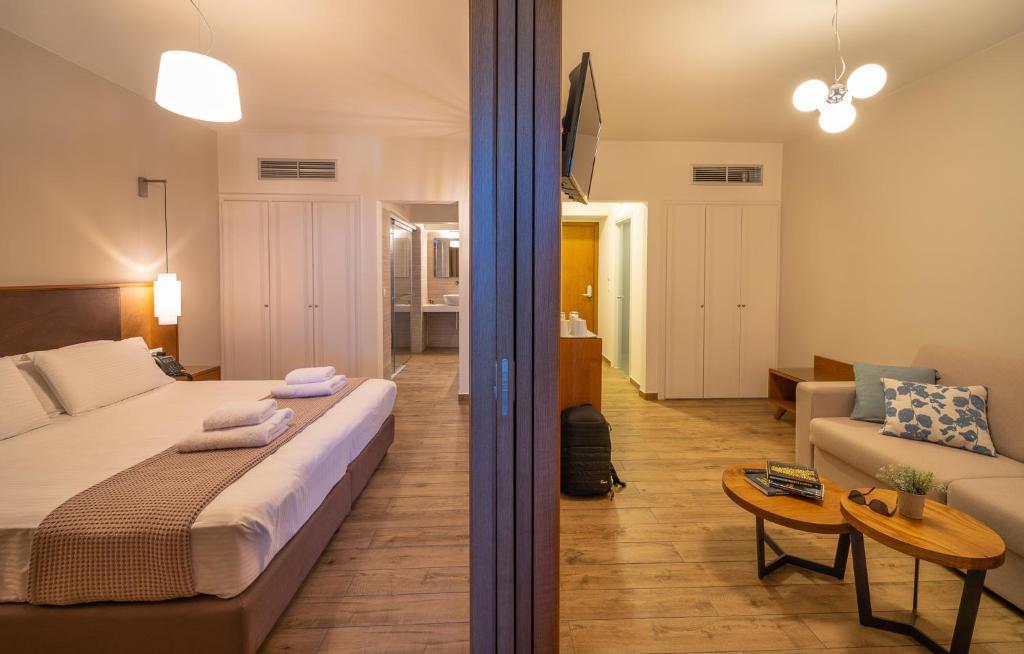 Postel nebo postele na pokoji v ubytování Achilles Hill Hotel