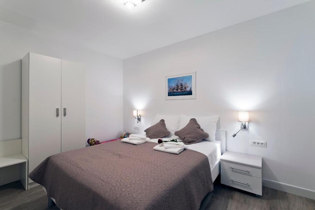 Postel nebo postele na pokoji v ubytování Ida 2 Apartments