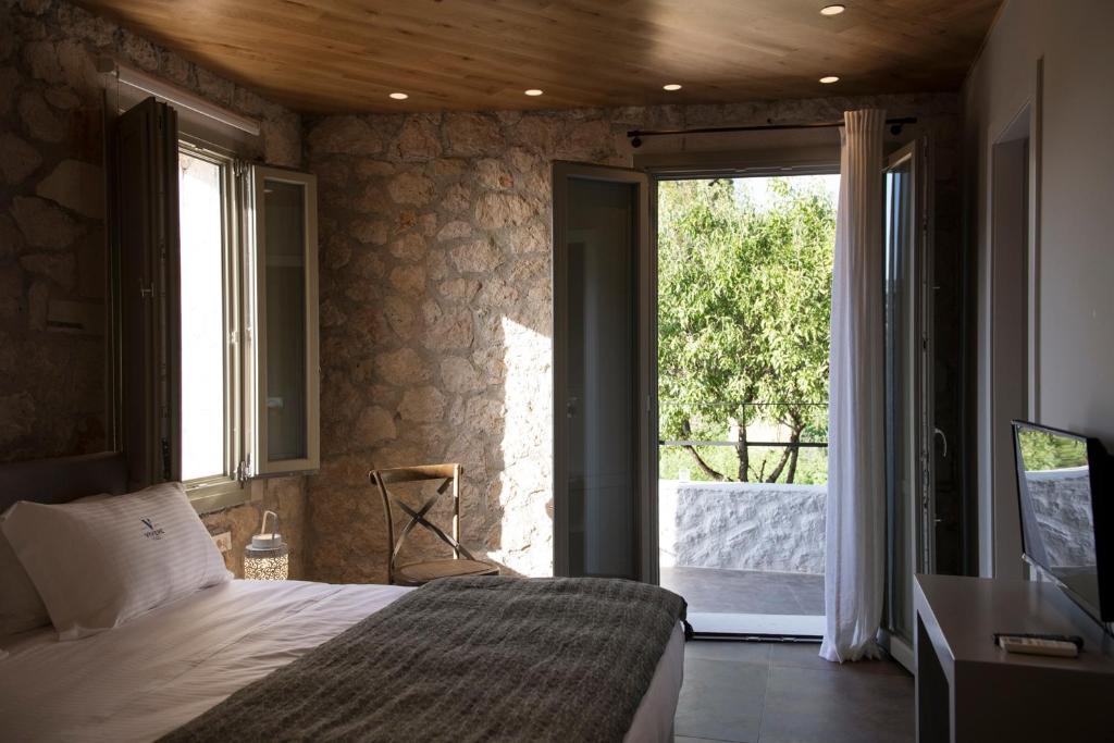 Postel nebo postele na pokoji v ubytování Villa Vivere