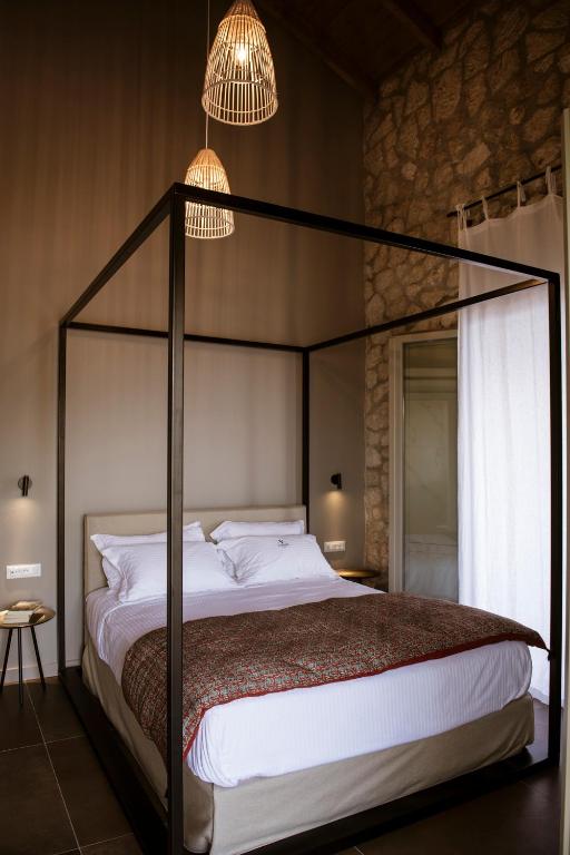 Postel nebo postele na pokoji v ubytování Villa Vivere