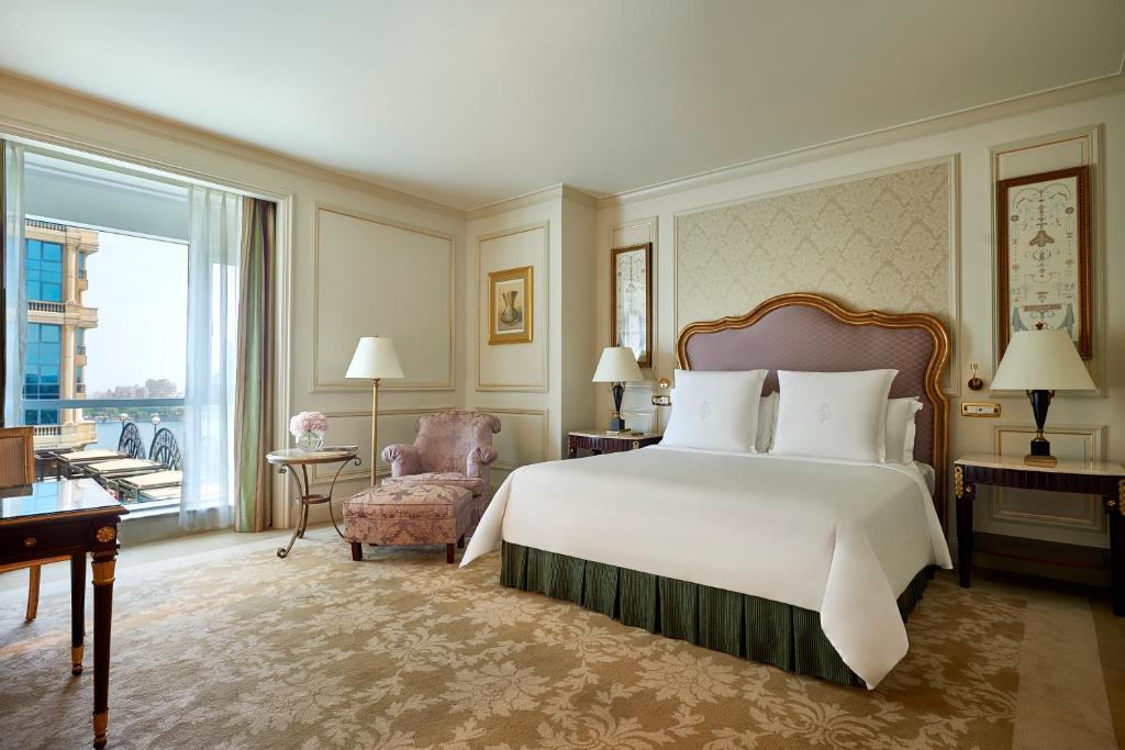 Krevet ili kreveti u jedinici u okviru objekta Four Seasons Cairo At The First Residence