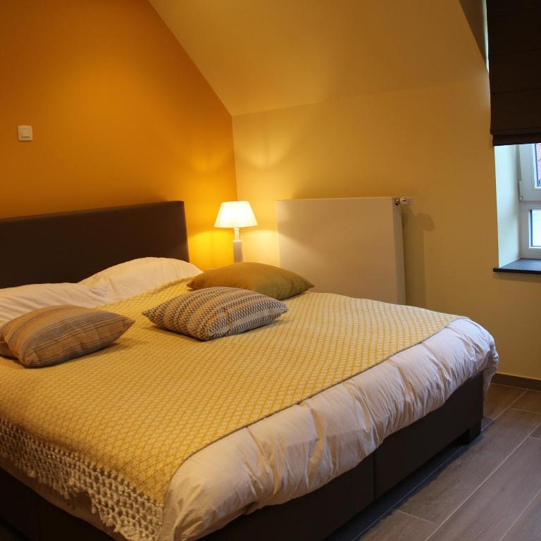 Postel nebo postele na pokoji v ubytování B&B Dotter 17