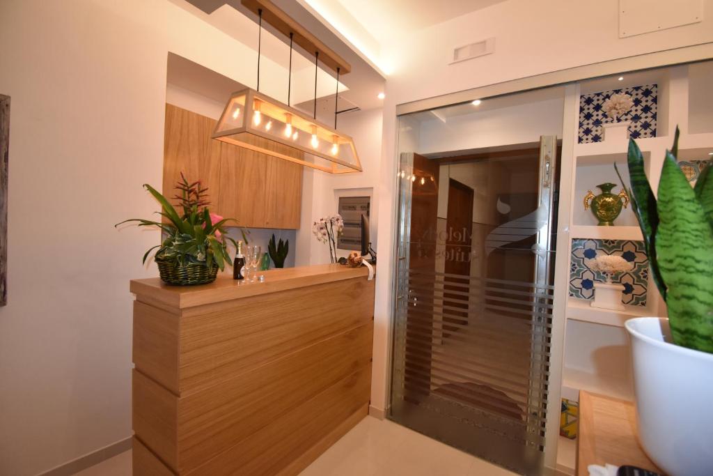 Kuchyň nebo kuchyňský kout v ubytování Melody Sorrento Suites