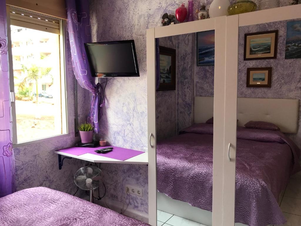 Postel nebo postele na pokoji v ubytování Rooms Complex "Cristimar", Los Cristianos