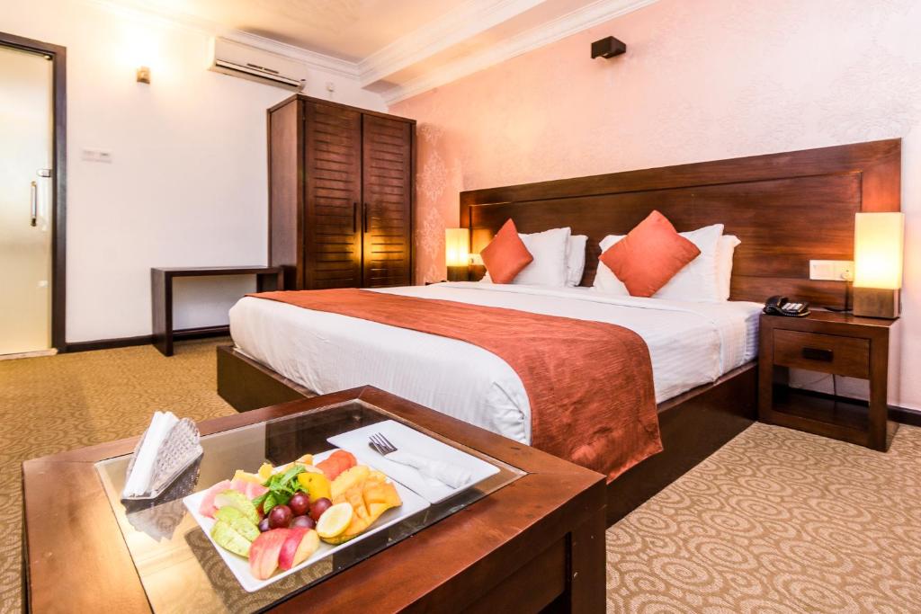 Cama o camas de una habitación en Ceylon City Hotel,Colombo