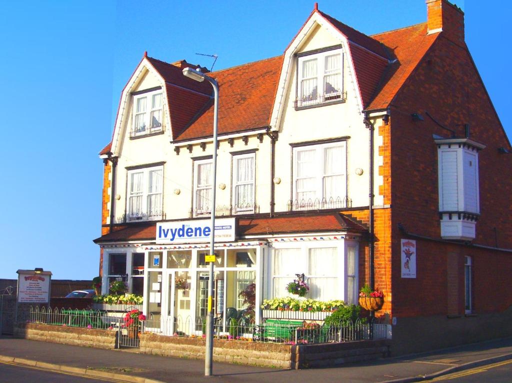 a large white building on the corner of a street at Ivydene Guest House in Skegness